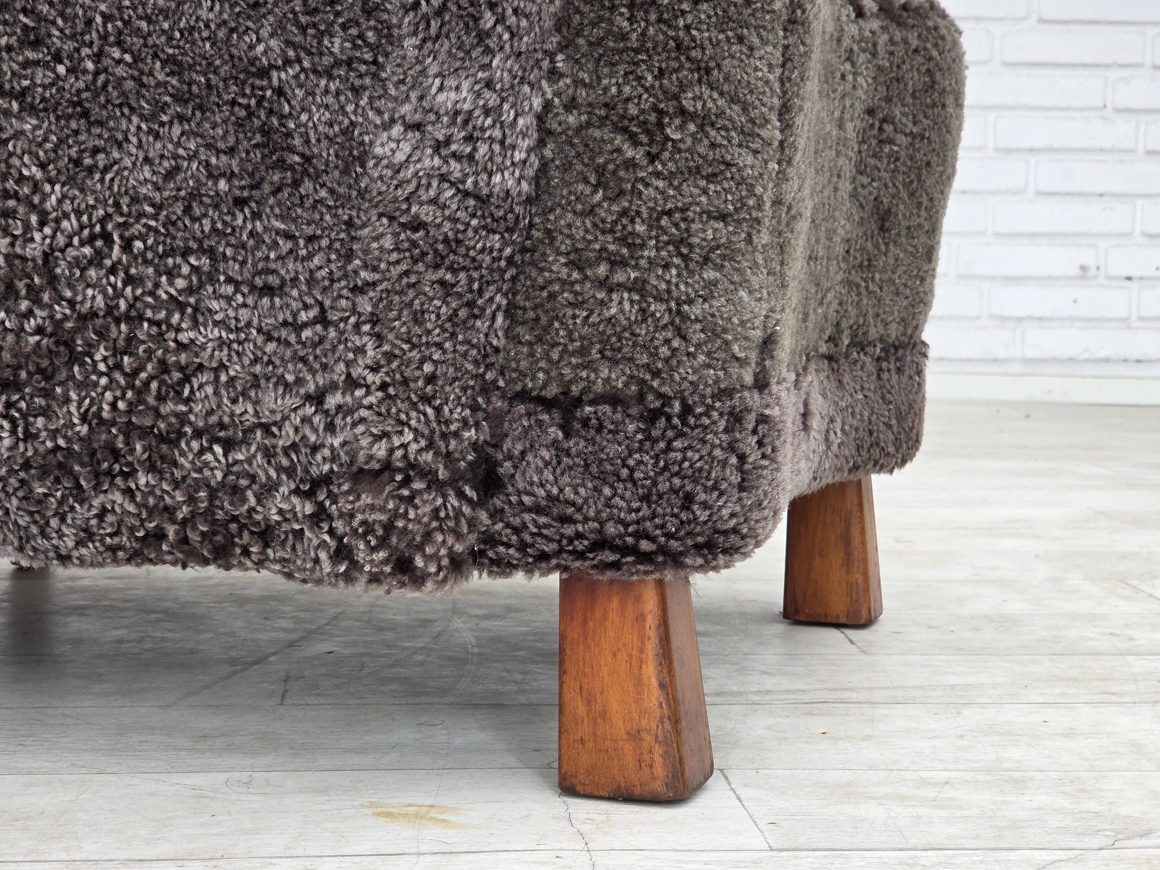 1960s, Danish design, reupholstered armchair, genuine sheepskin.