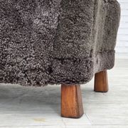 Années 1960, design danois, fauteuil rembourré, véritable peau de mouton.