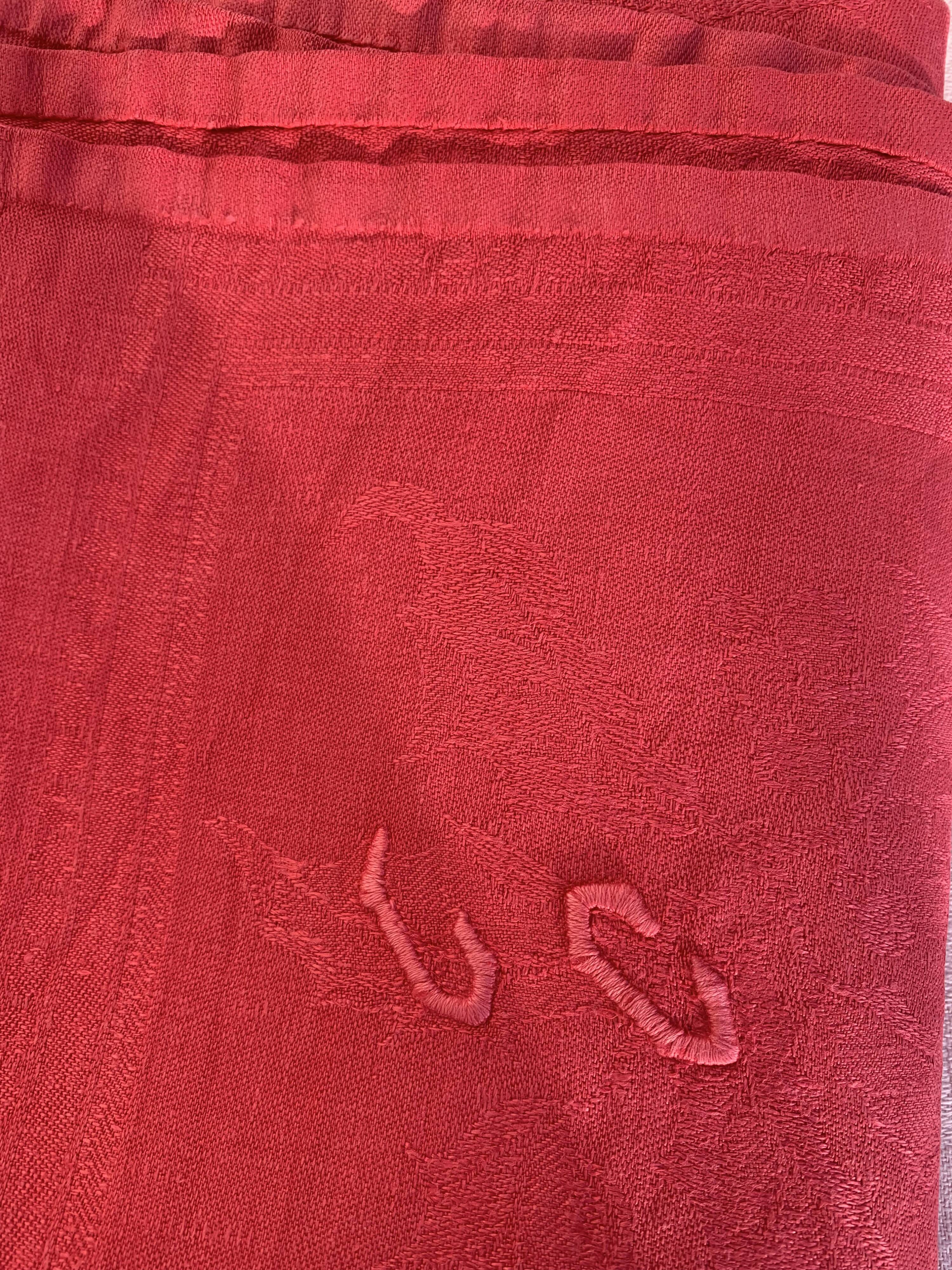Duo set, consisting of two large pink-dyed cotton and linen towels, embroidered, TK monograms