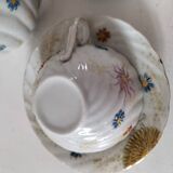 coffee pot, cup and saucers