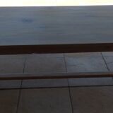 Large honey-colored farmhouse table in solid oak