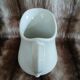 2 antique pitchers in white earthenware