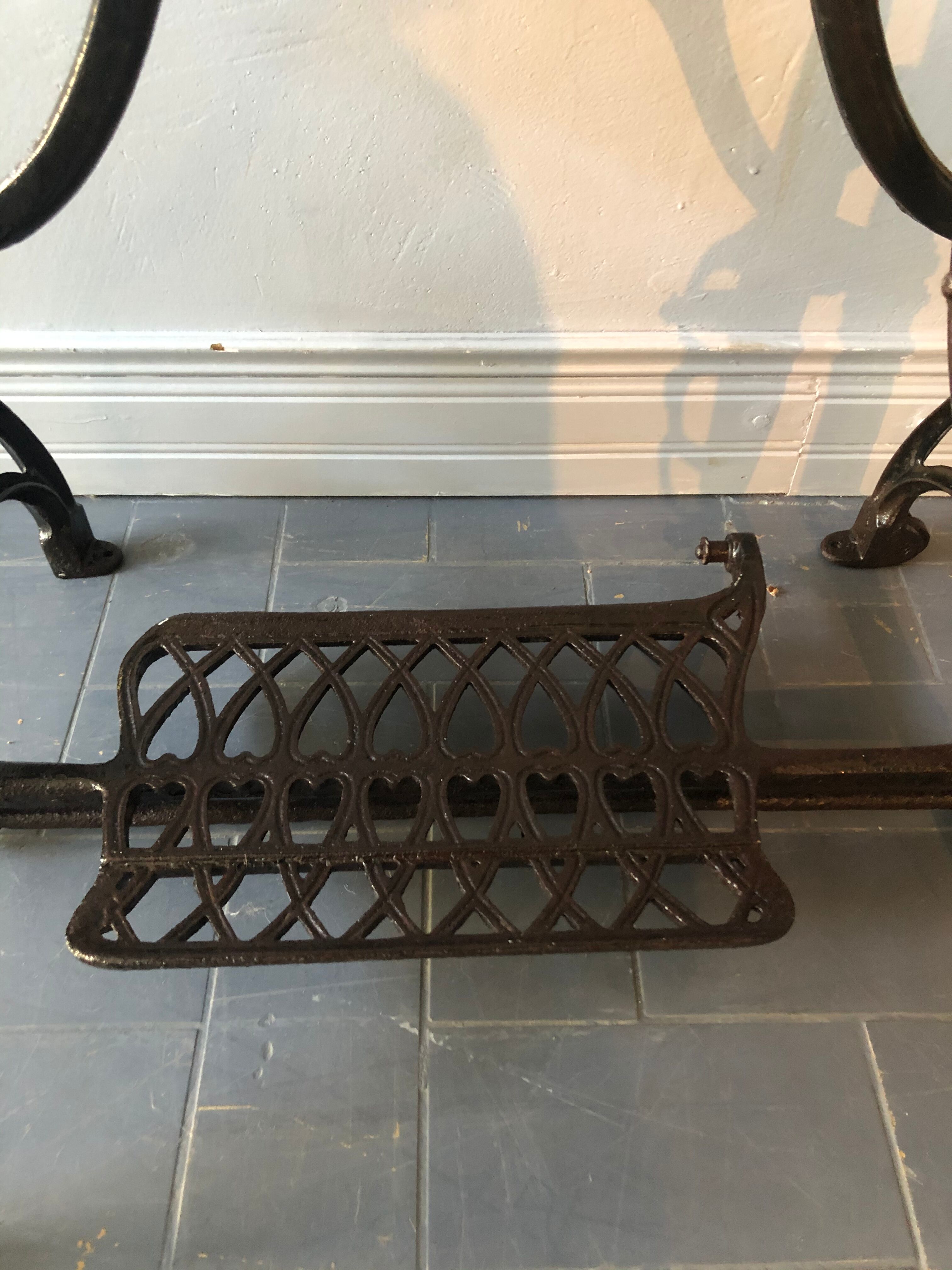 Ancient table, cast iron footing