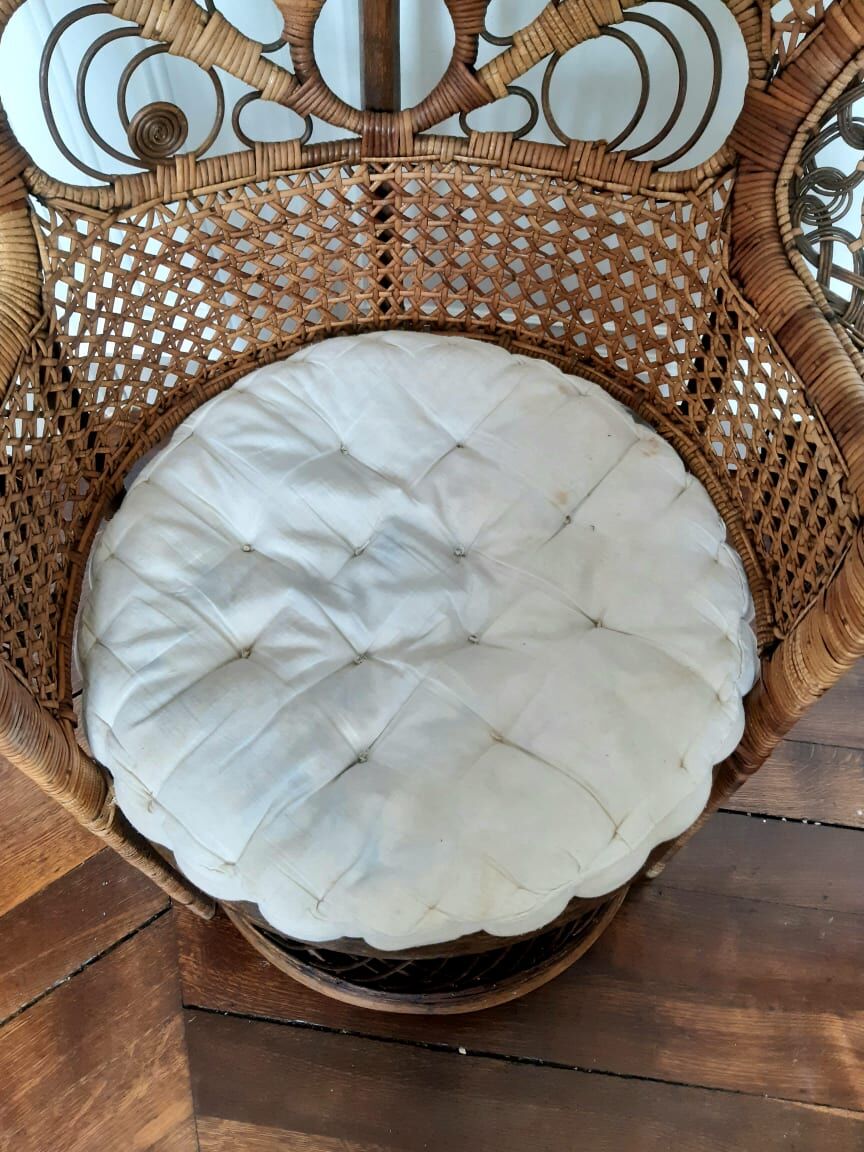 Peacock rattan armchair, circa 1960