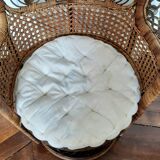 Peacock rattan armchair, circa 1960