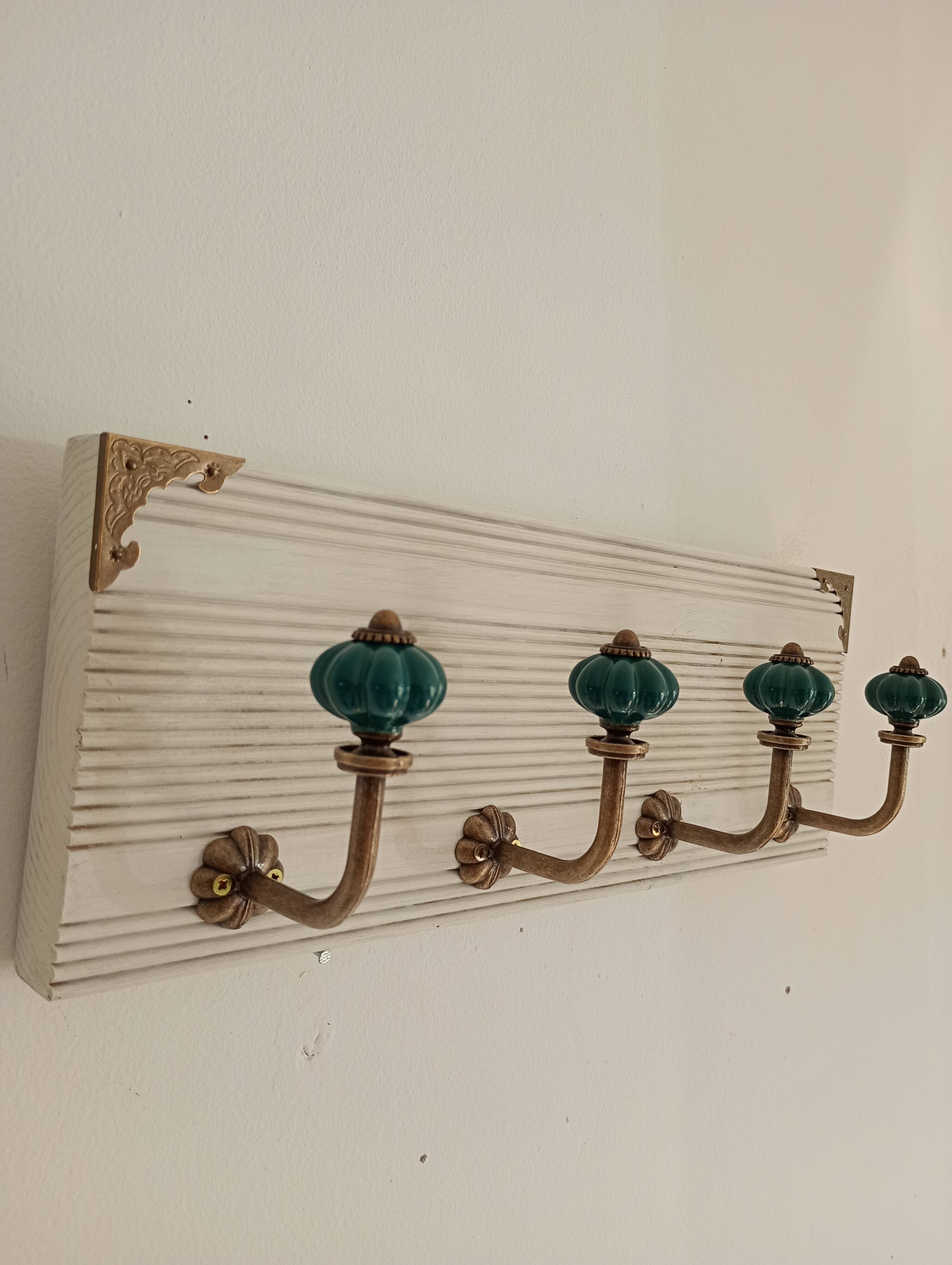 Wall-mounted coat rack in bleached wood and emerald green ceramic hooks –