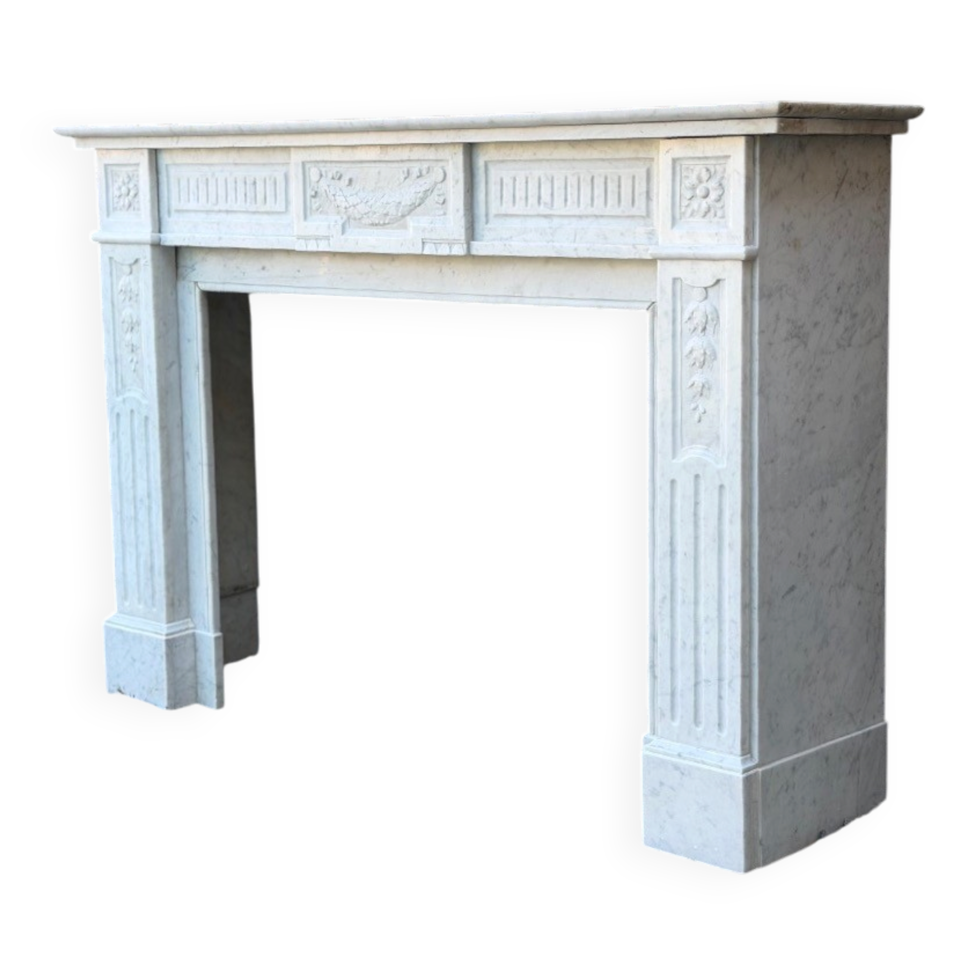 Louis XVI style fireplace in white Carrara marble, circa 1880.