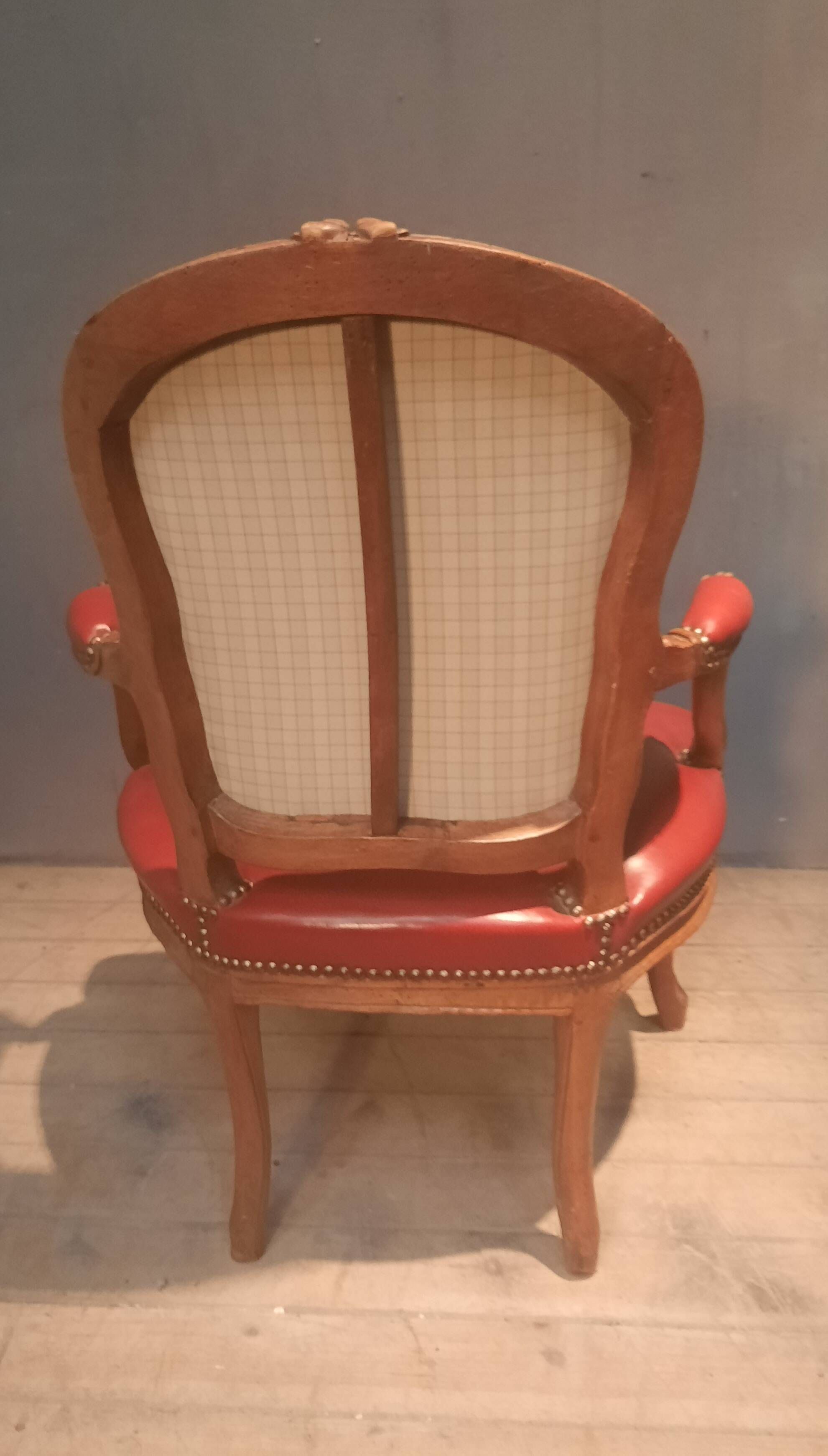 Louis XV period armchair covered in leather.