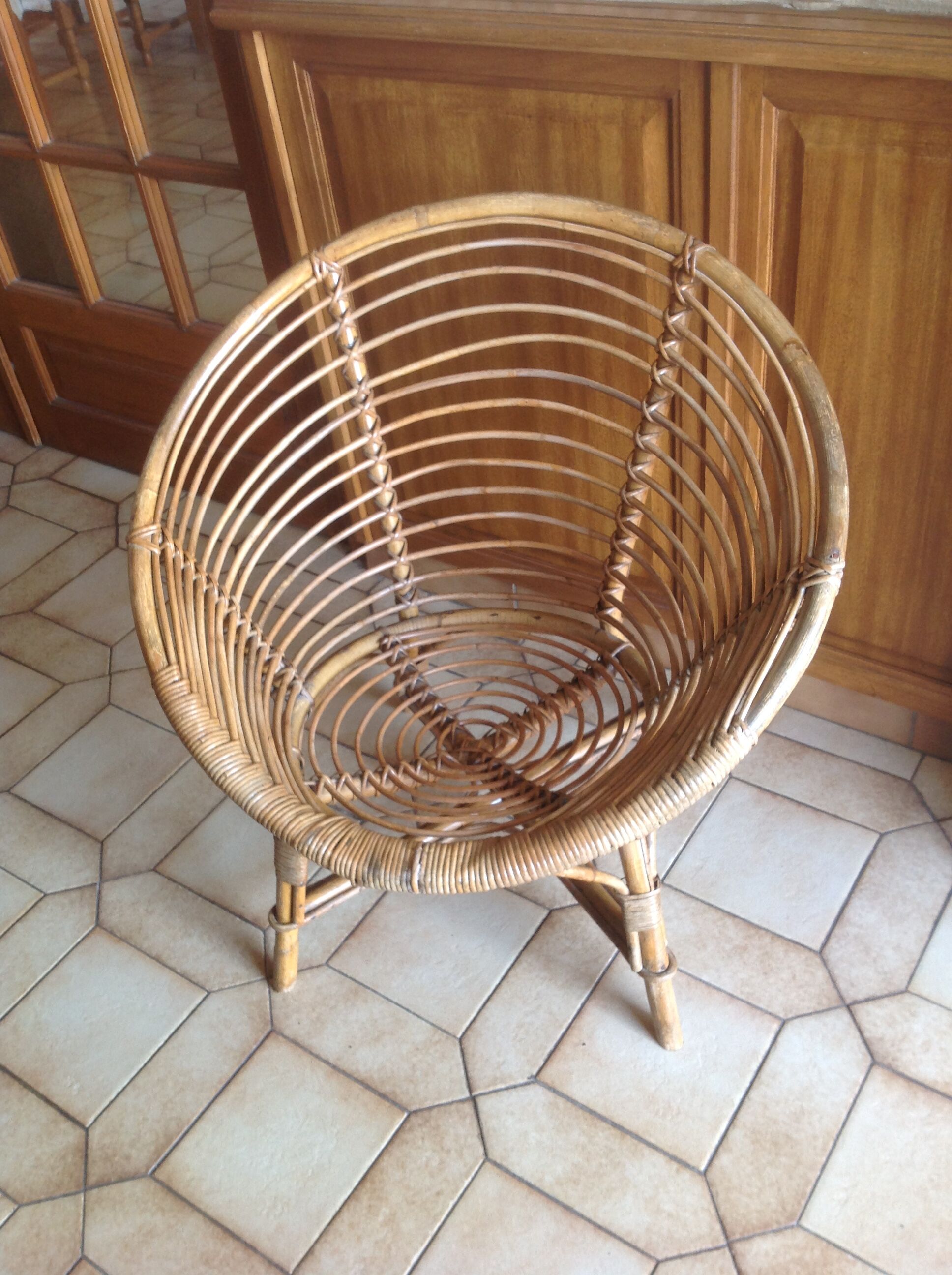 Vintage shell rattan armchair