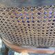 Paire de fauteuils en cuir joues en cannage