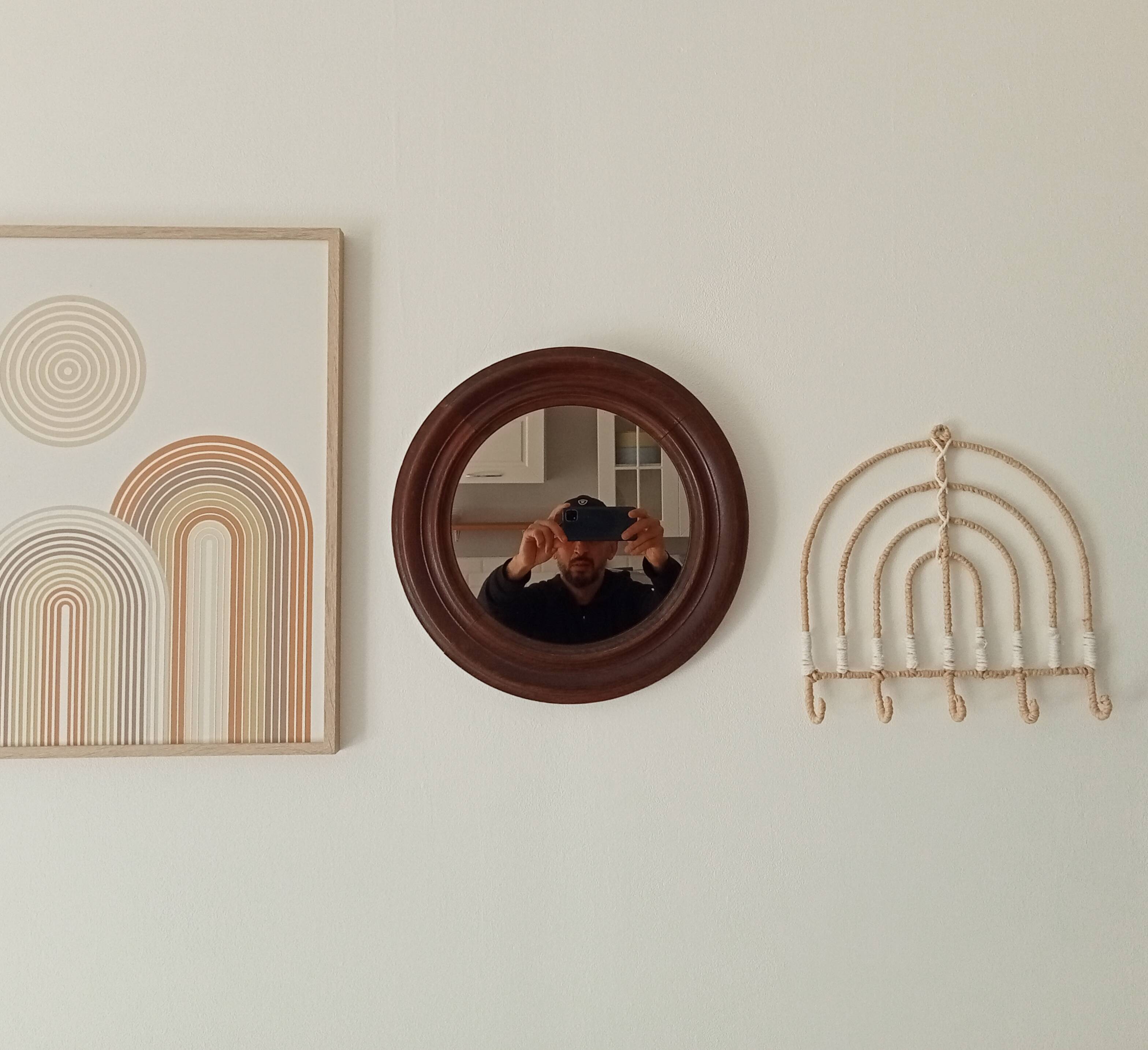 Antique round wooden mirror