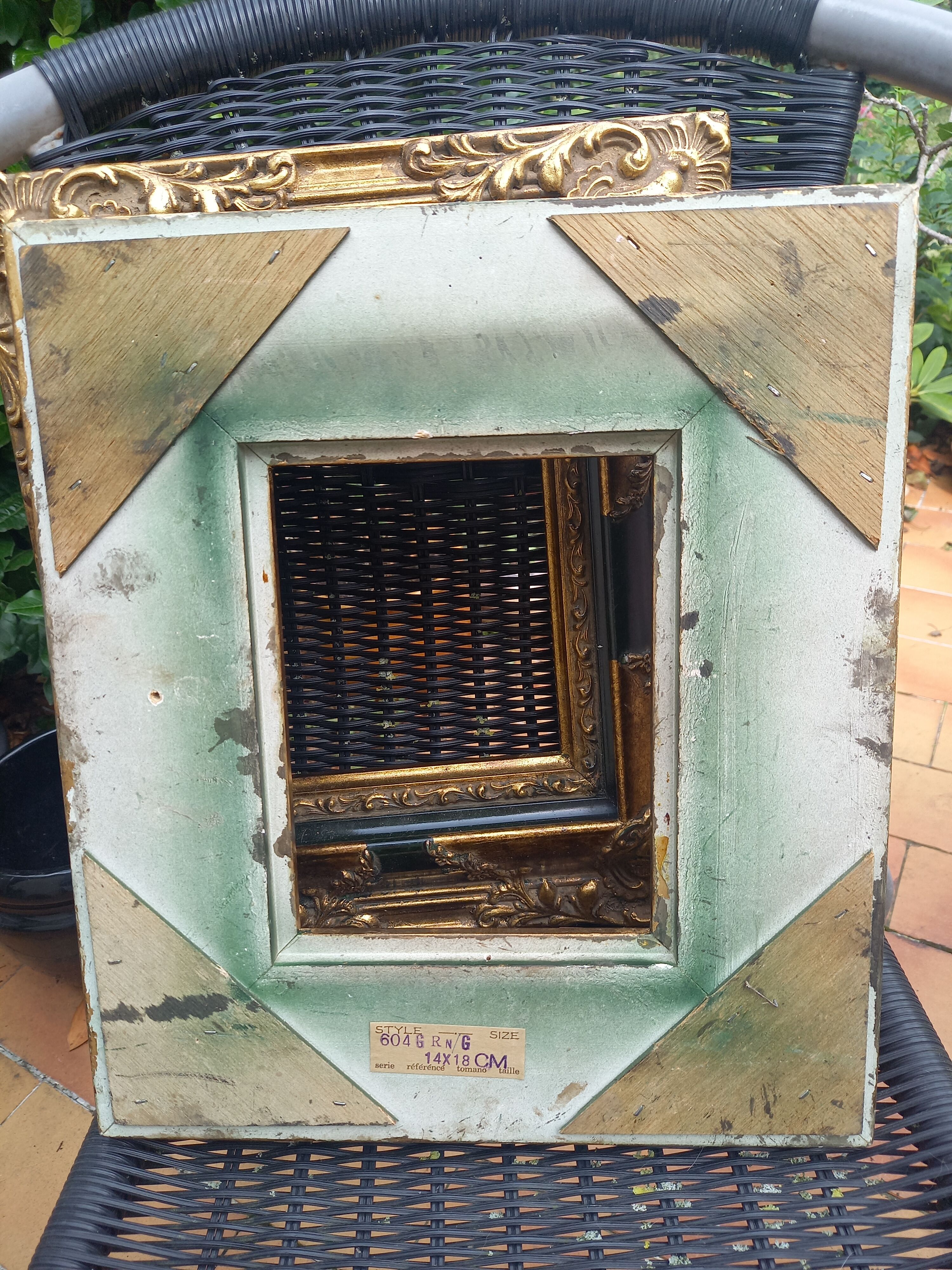 Pair of baroque frames in vintage gilded wood