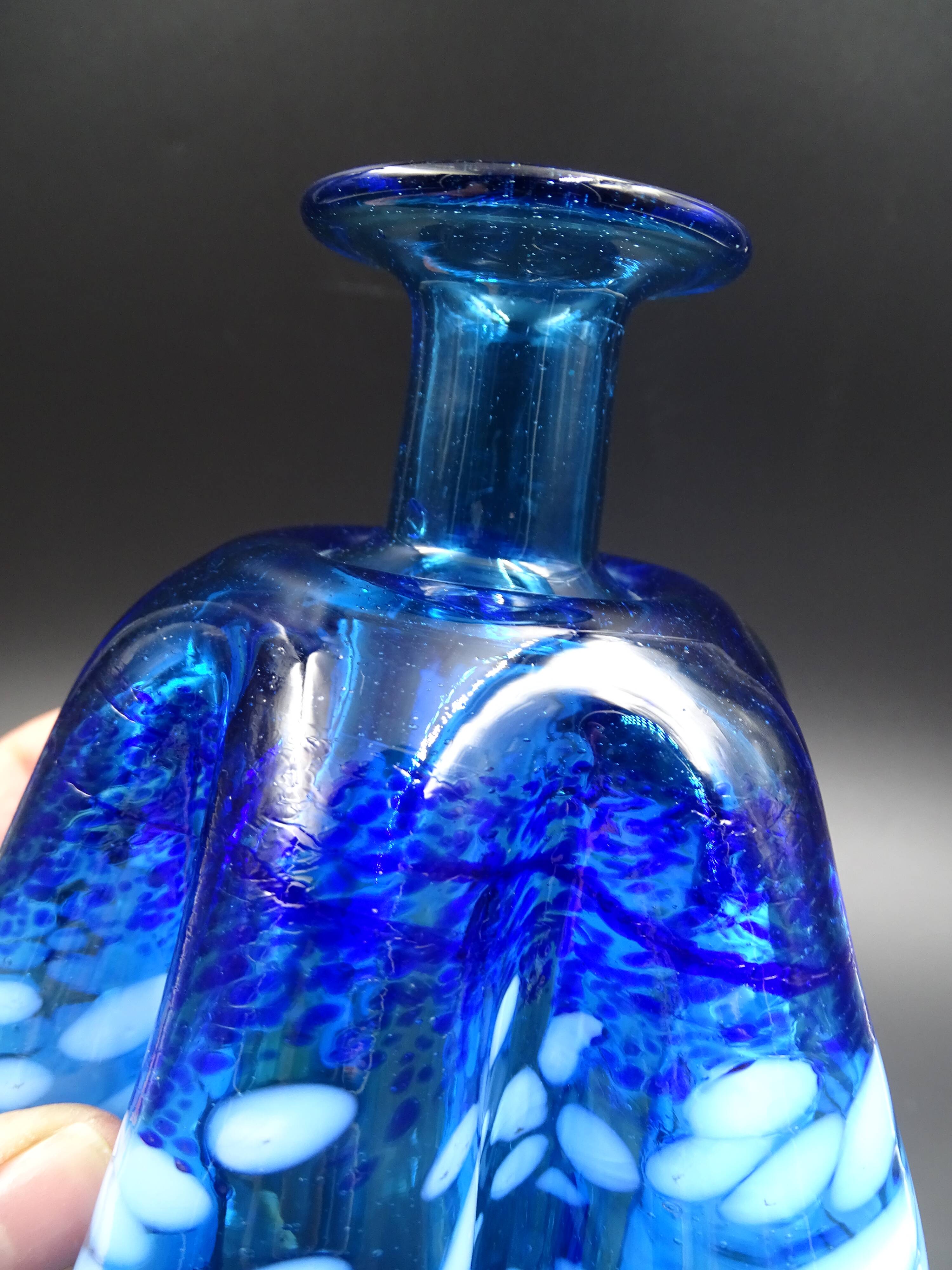 Blue glass vase and touches of white