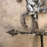 Horse-shaped weather vane in brushed steel artisanal work by ironworker