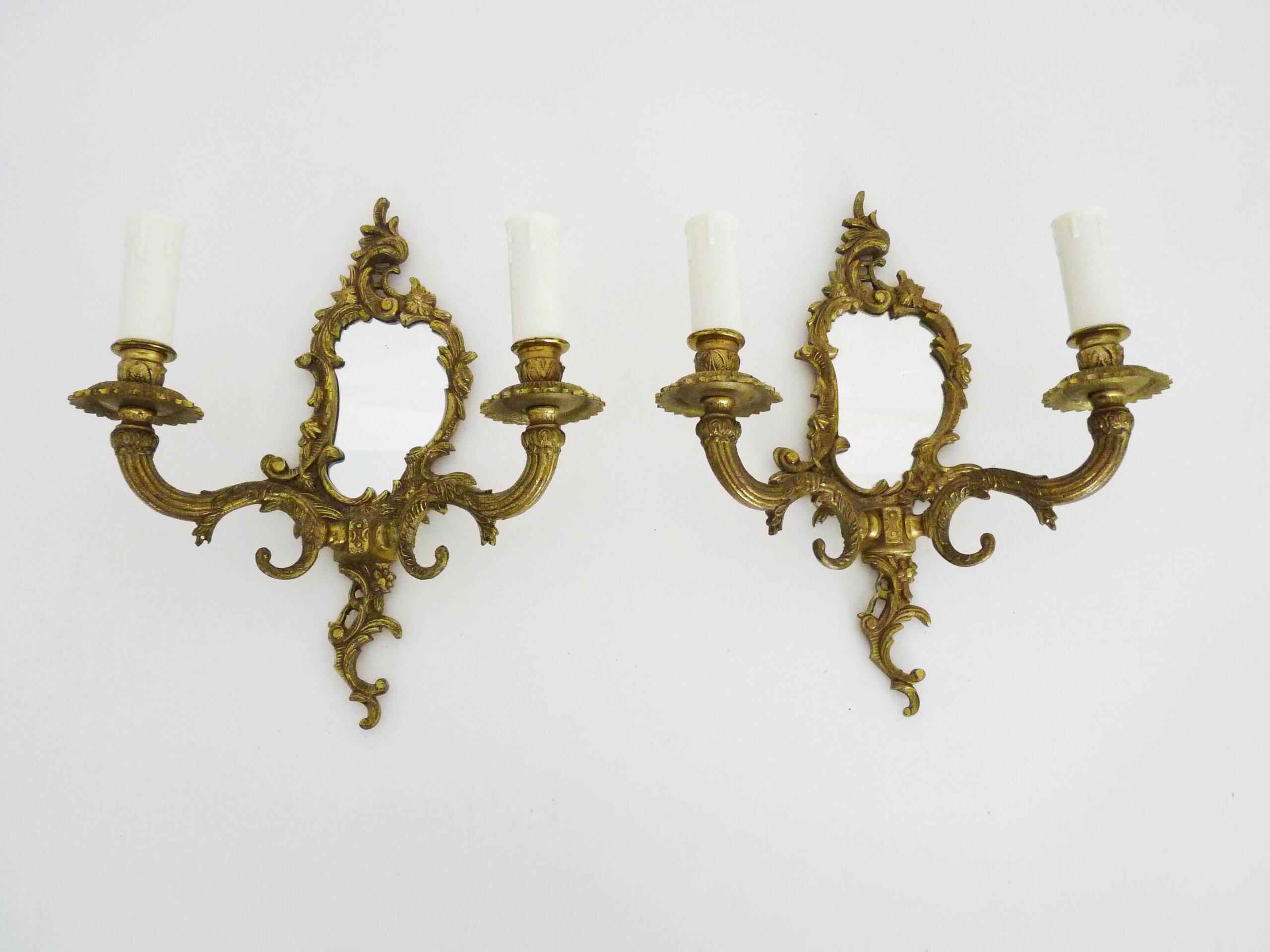 Pair of vintage bronze wall sconces with mirror and 2 candles. 1960s