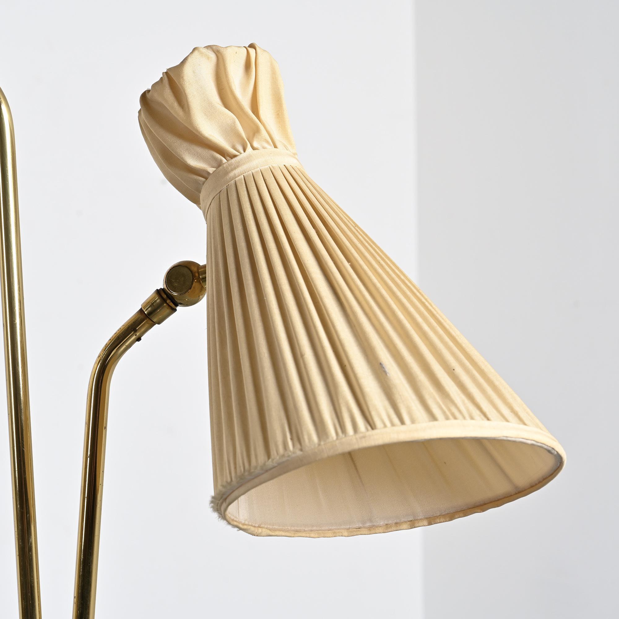 Two-arm adjustable floor lamp by BAG Turgi, Switzerland, 1950s.