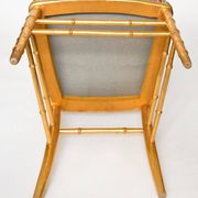 Paire de chaises en bois doré imitant le bambou