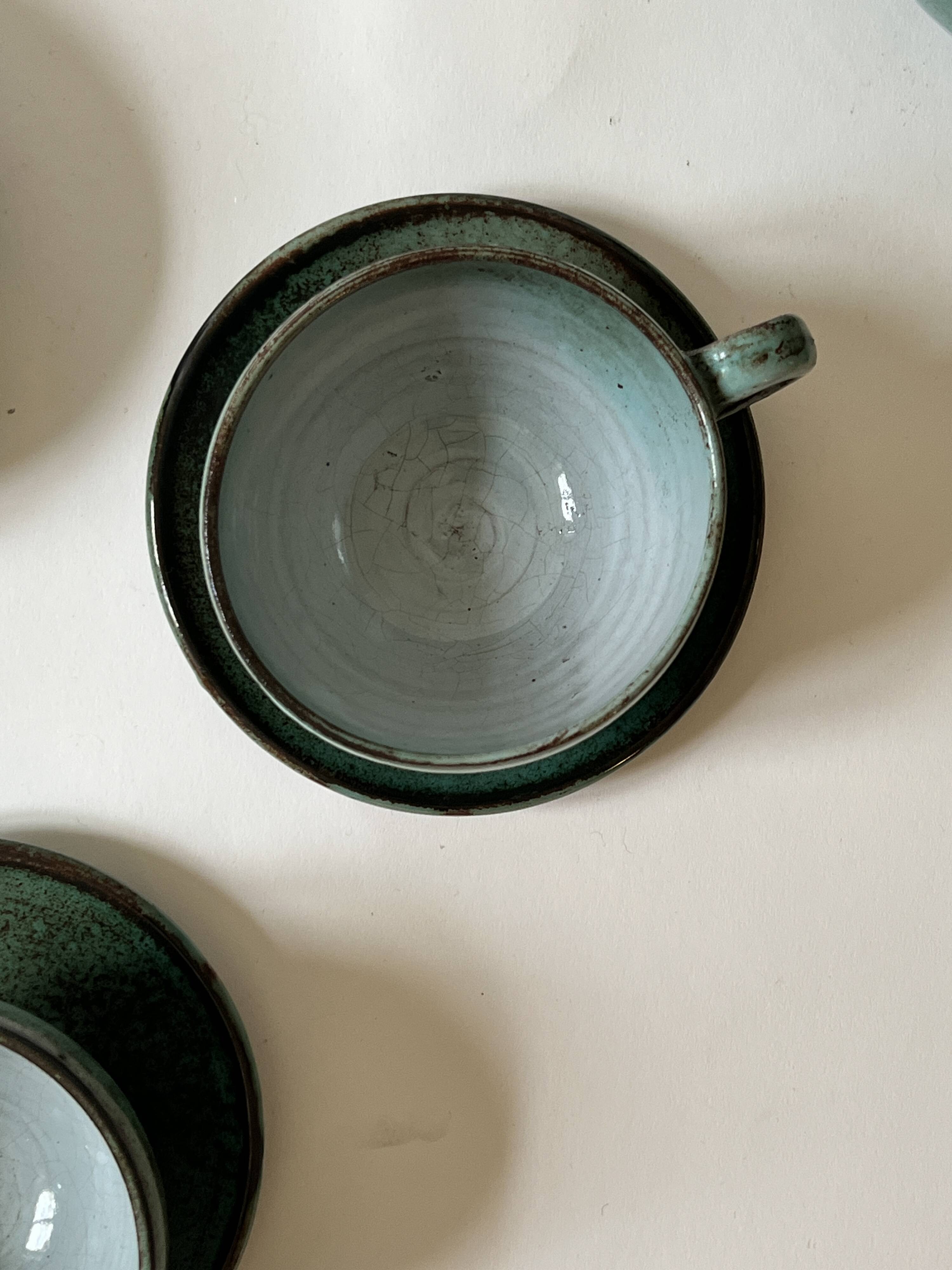 Handmade and signed glazed ceramic coffee cups, circa 1950.