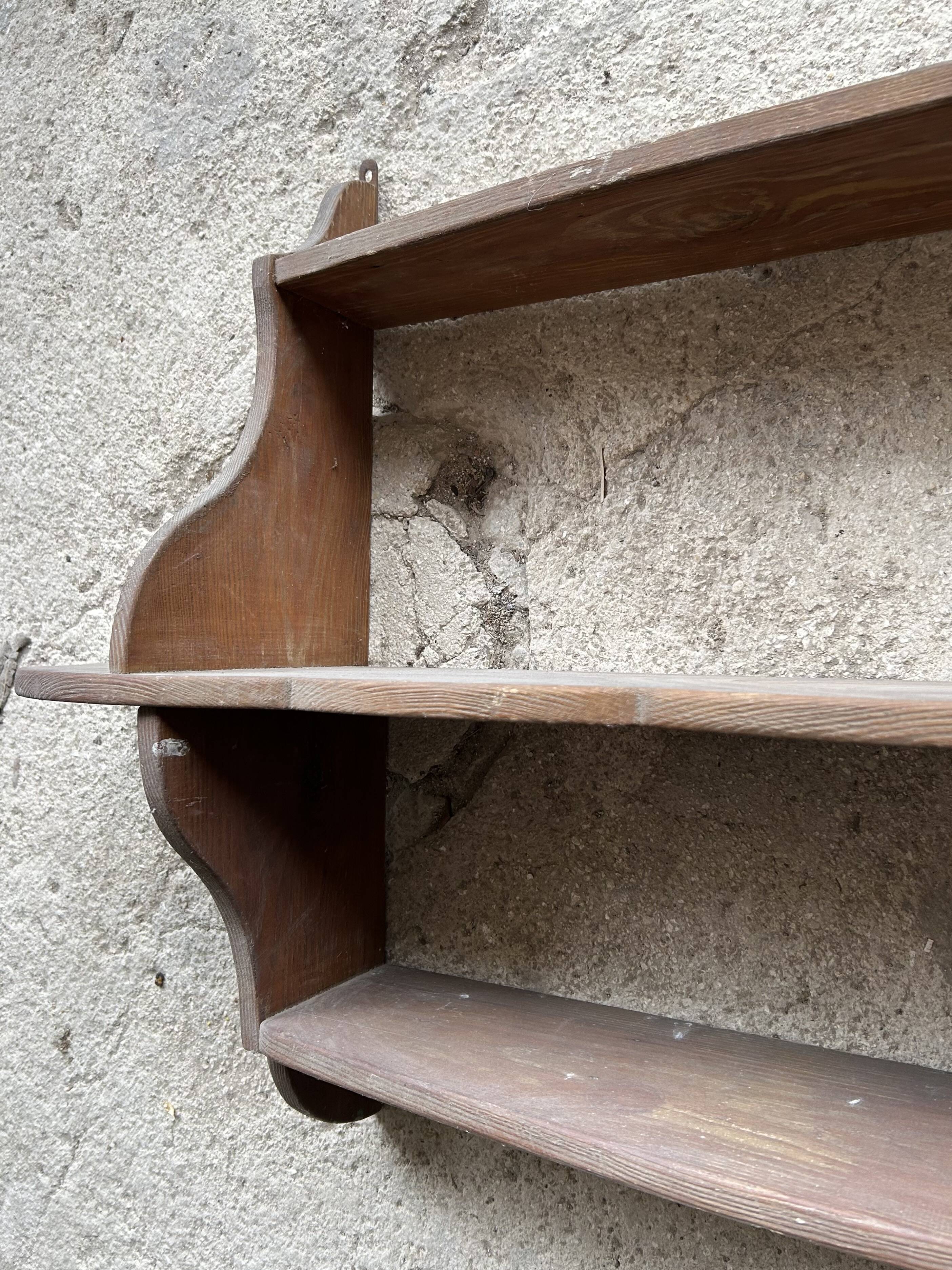Antique wooden wall shelf