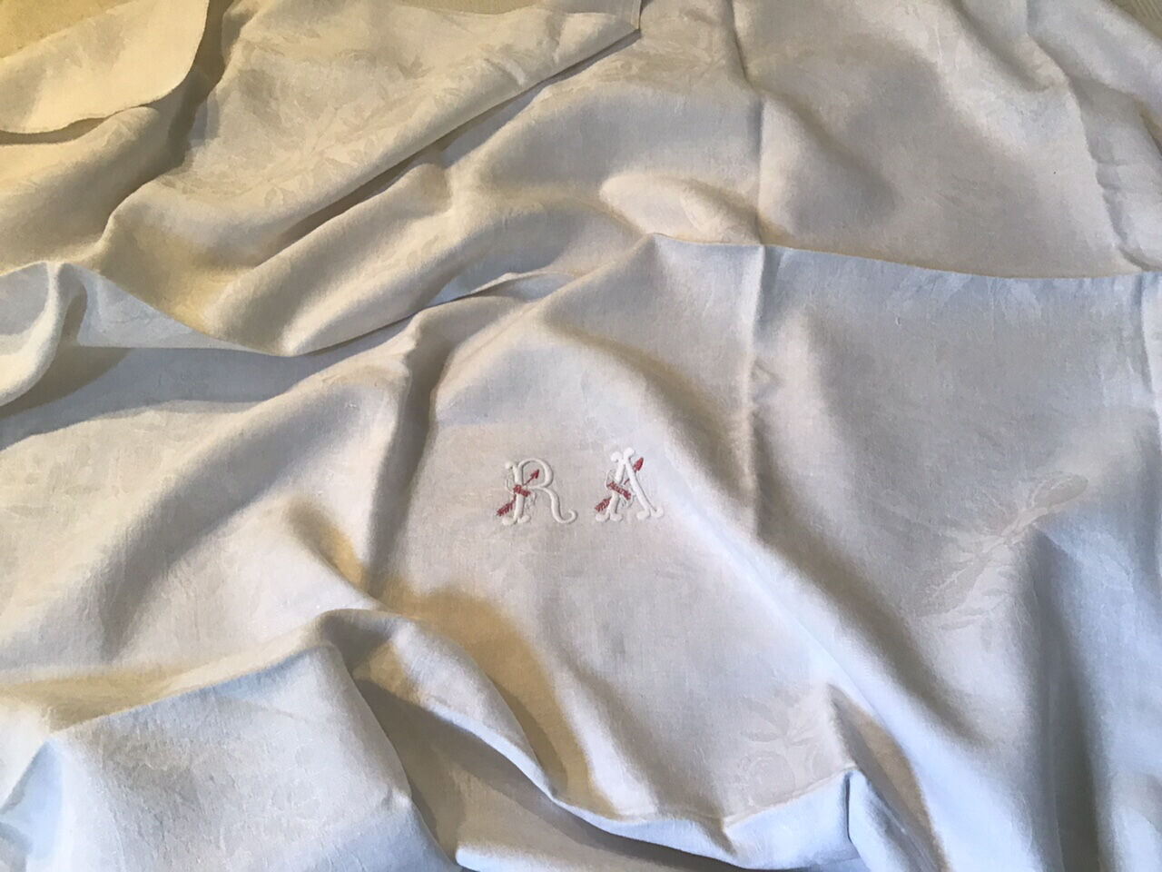 Square linen tablecloth marked RA