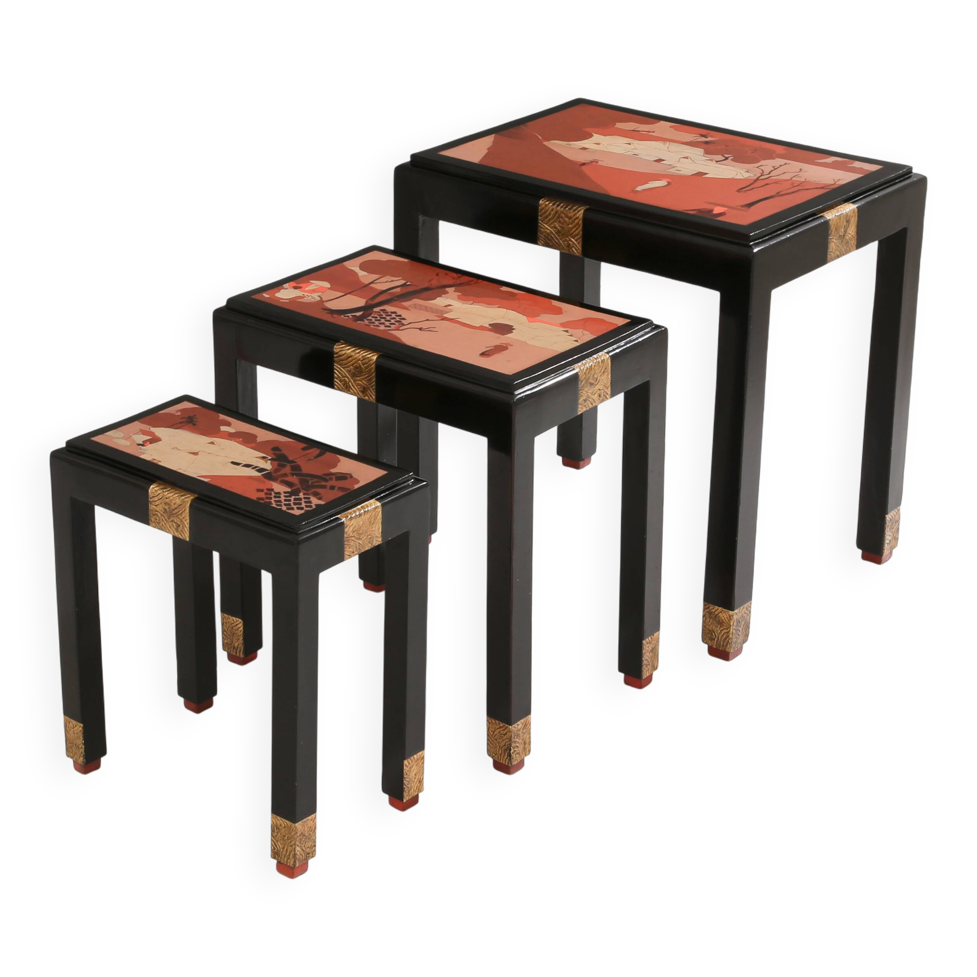 Set of three nesting tables with Asian decor, blackened wood, circa 1920.