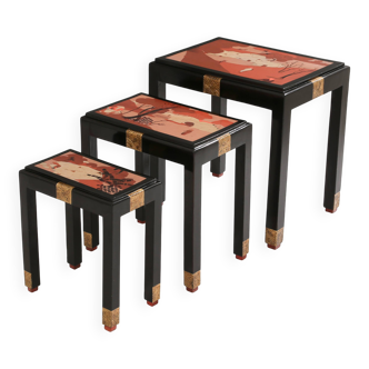 Set of three nesting tables with Asian decor, blackened wood, circa 1920.
