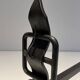 Pair of Wrought Iron Andirons with Obelisk and Belt Motifs