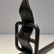 Pair of Wrought Iron Andirons with Obelisk and Belt Motifs