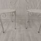Pair of wrought iron garden chairs