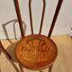 pair of bistro chairs, curved wood and pattern on the seat