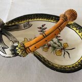 Decorated earthenware dish with handle signed Henriot Quimper