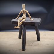 Dark octagon tripod stool