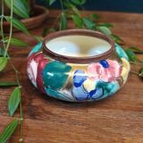 Vintage ceramic bowl with floral patterns