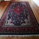 Large vintage Persian wool rug (250 × 350 cm) – warm colours