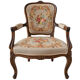 Louis XV style carved wooden armchair with floral needlepoint upholste