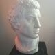 Patinated plaster man head.