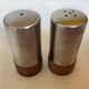 Salt and pepper set in teak and metal, Scandinavian style.