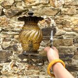 Medieval style metal and amber glass wall lamp