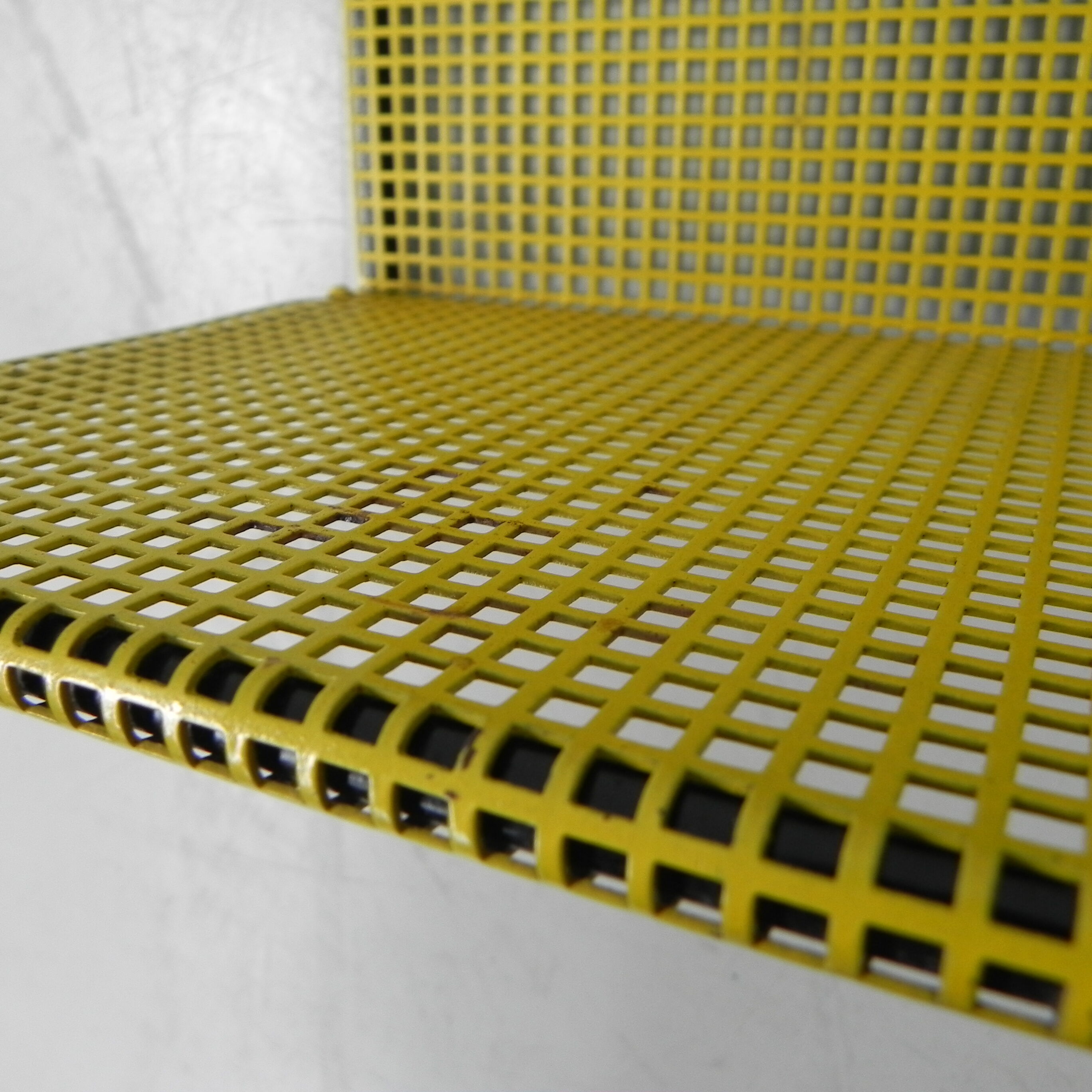 Pilastro wall rack with perforated steel plate