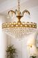 Lustre corbeille en laiton et cristal taillé, style Empire