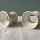 Set of 4 white porcelain diabolo shells