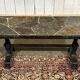 Coffee table in wrought iron with a slate top, work from the 1950s.