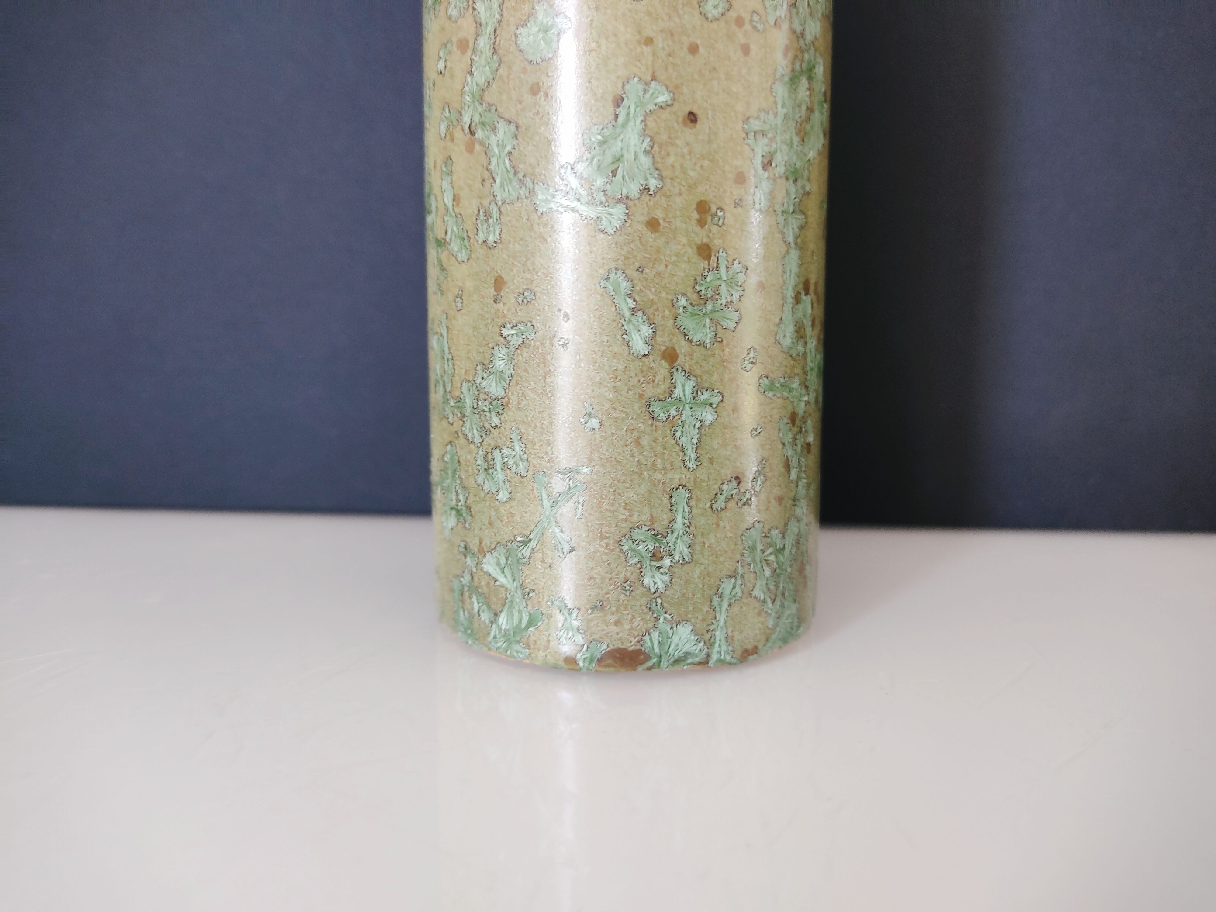 Pale green ceramic roller vase