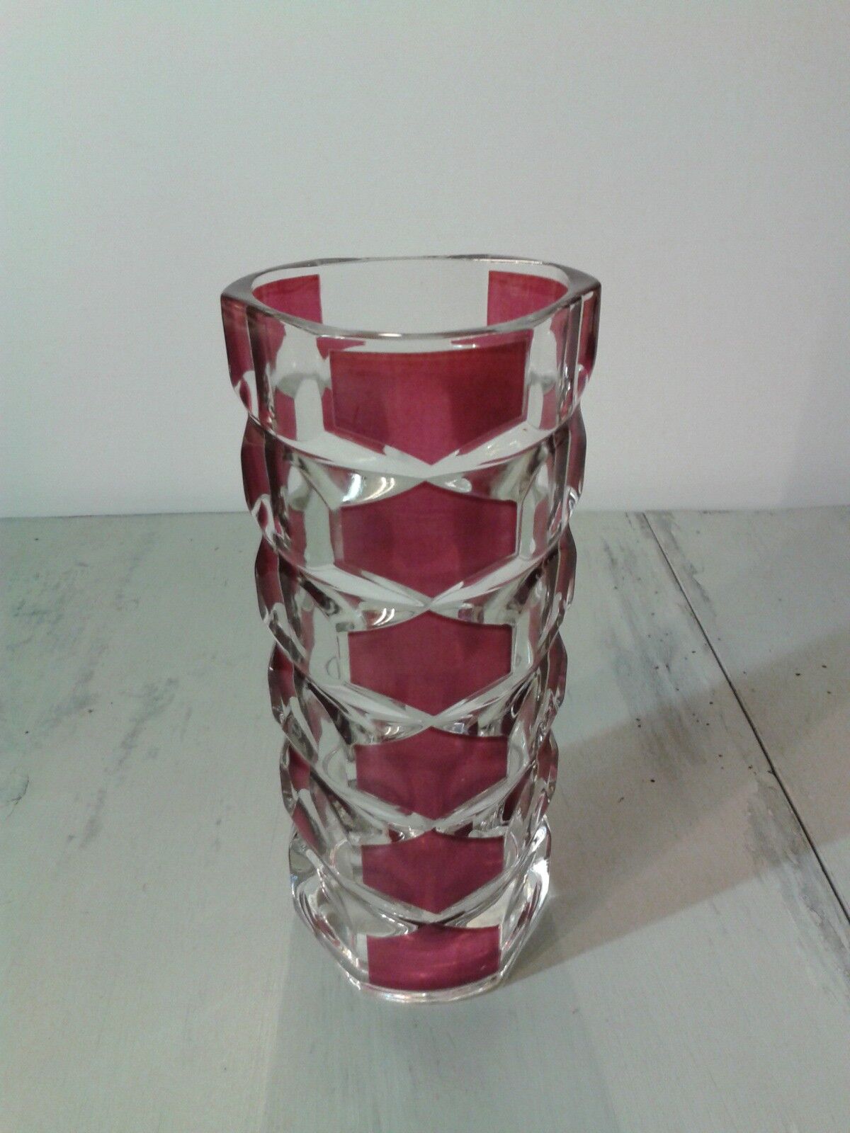 Thick red faceted glass vase