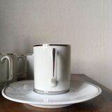 9 cups and coffee cups in porcelain Limoges
