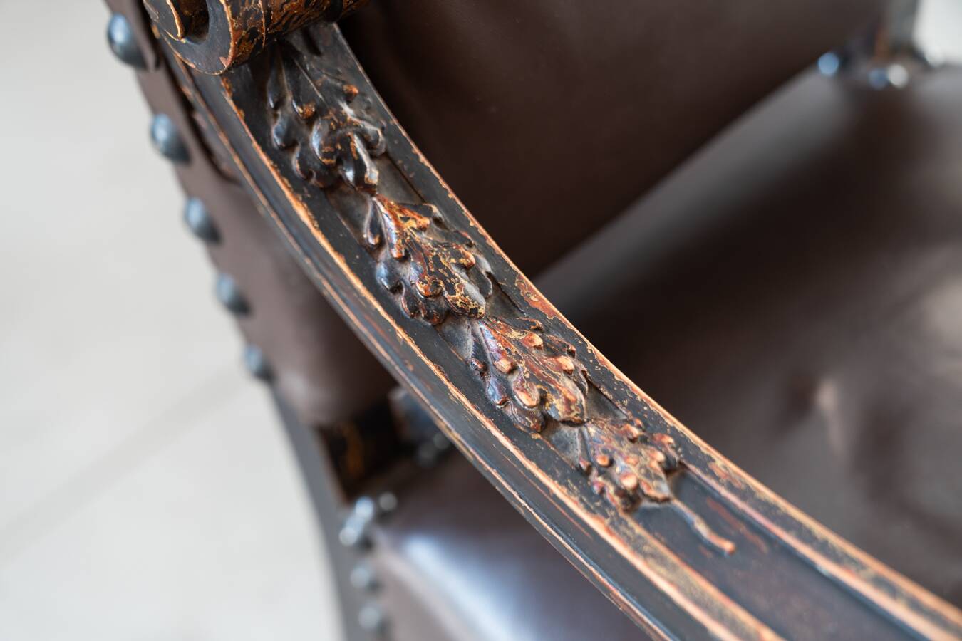 19th century beechwood, metal, and leather throne