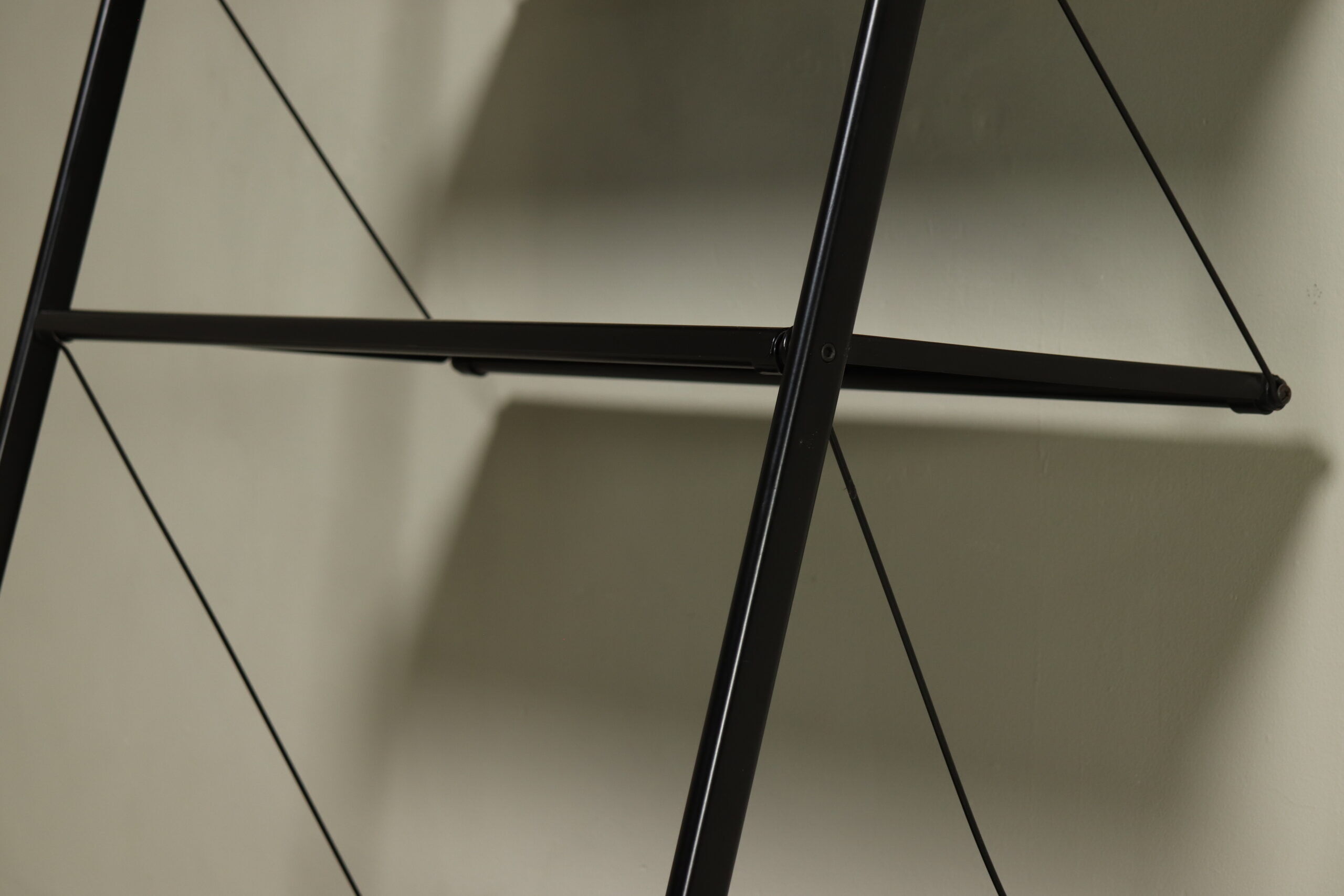 Postmodern freestanding perforated steel shelving unit 1980s