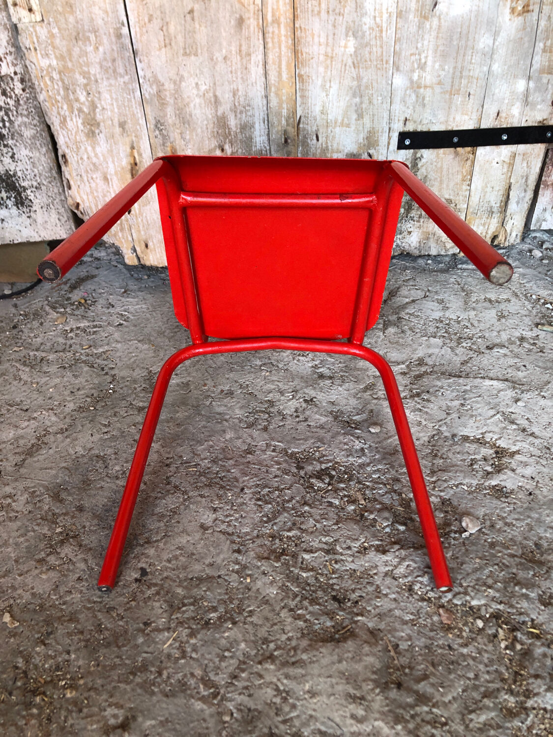 Set of 4 red metal chairs