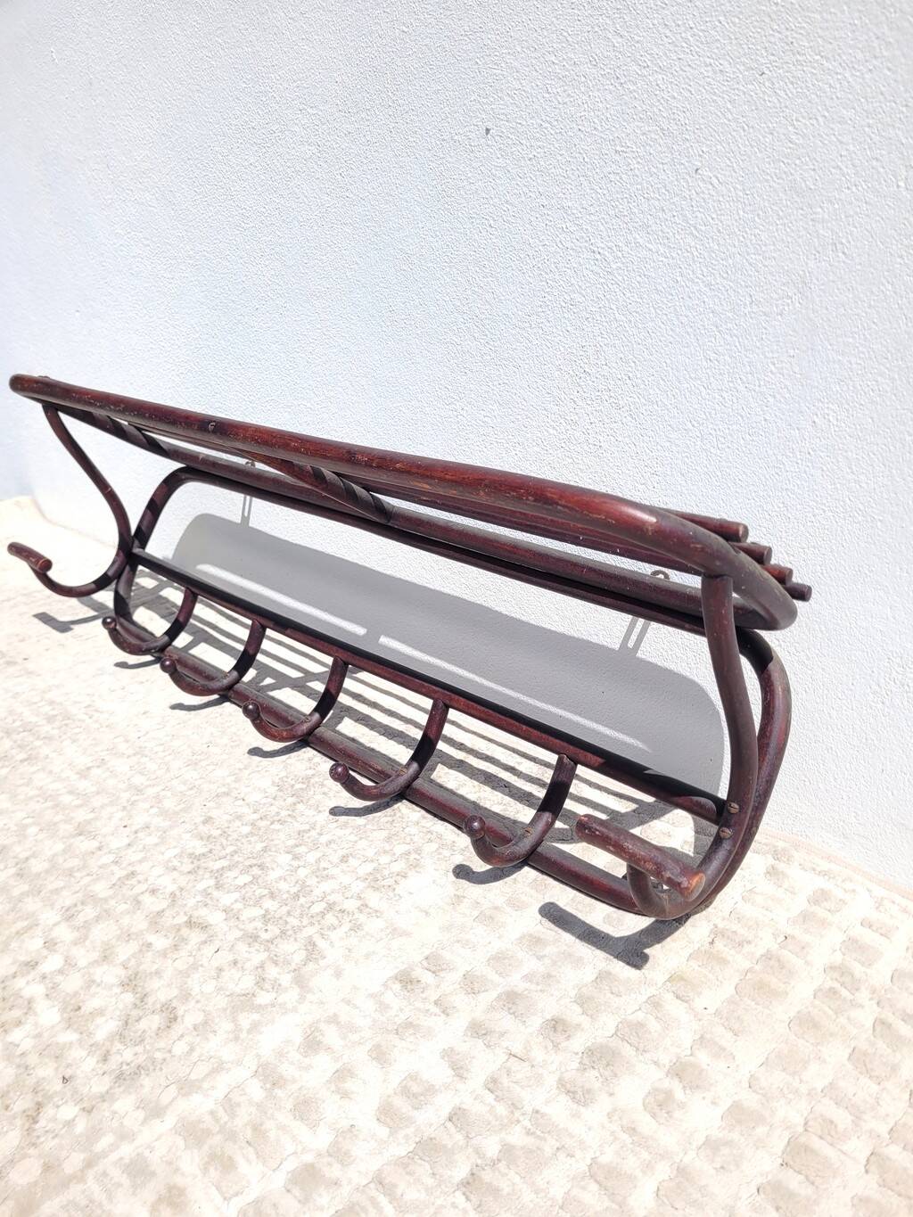 Old wooden cloakroom coat rack
