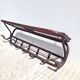 Old wooden cloakroom coat rack